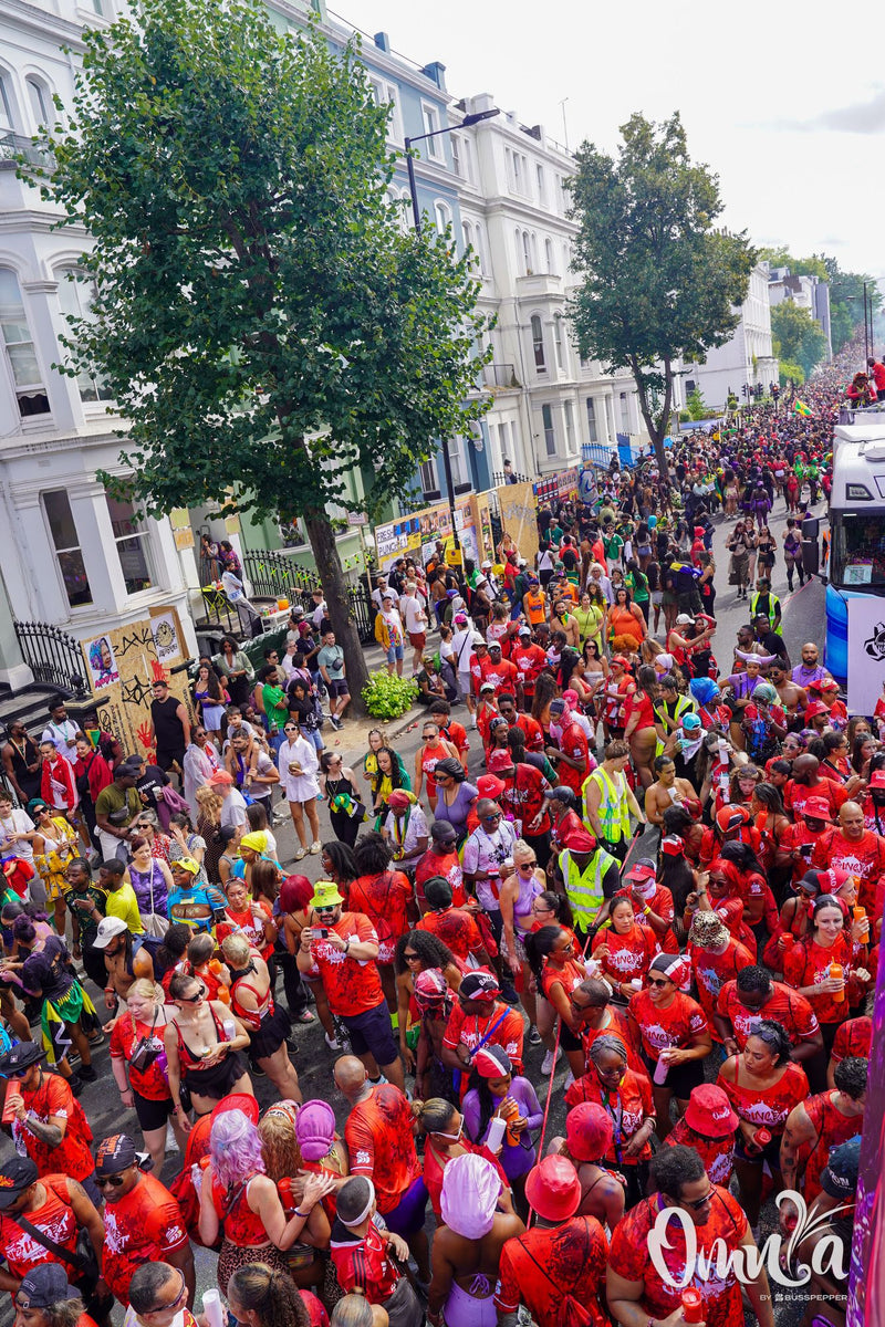 Omnia Carnival masqueraders on the road at Notting Hill Carnival 2026