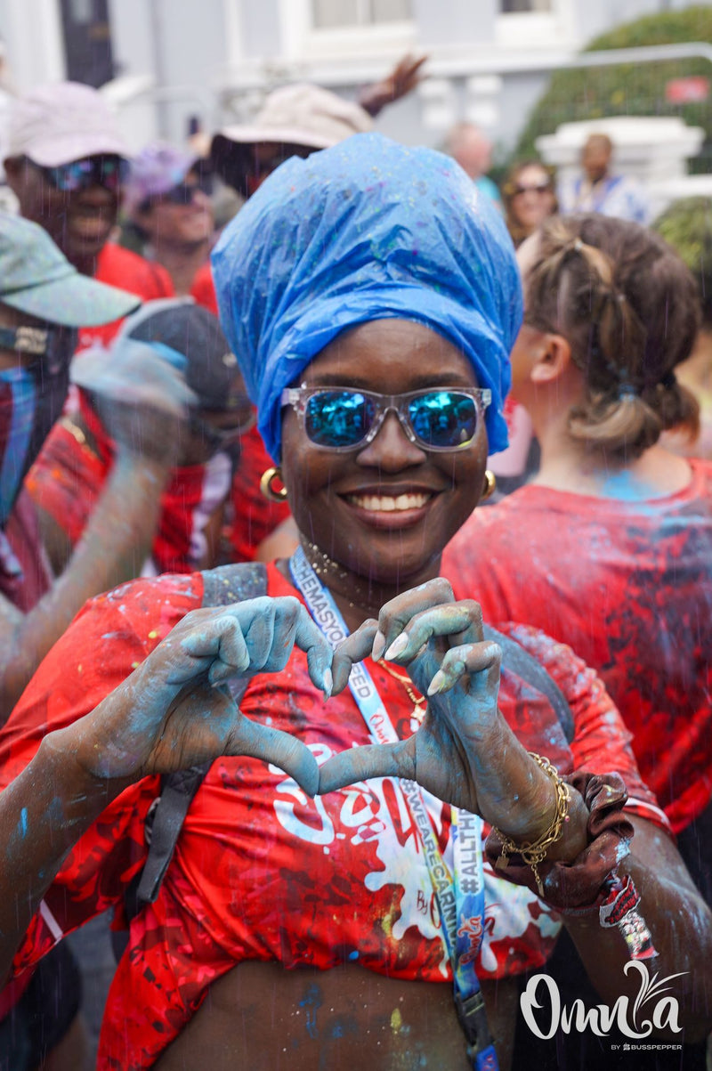 Omnia Carnival masqueraders on the road at Notting Hill Carnival 2026