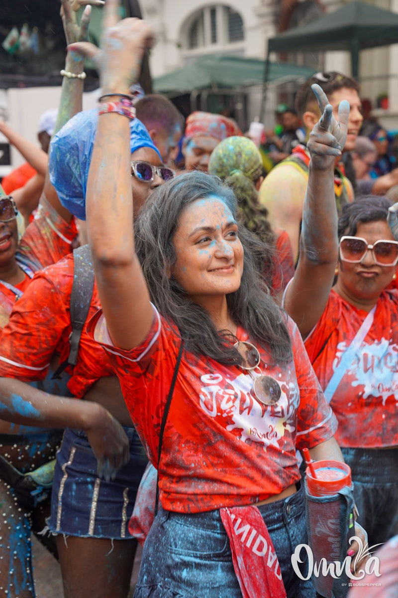 Omnia Carnival masqueraders on the road at Notting Hill Carnival 2026