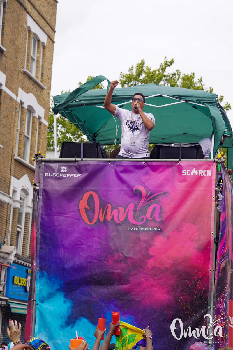 Omnia Carnival masqueraders on the road at Notting Hill Carnival 2026