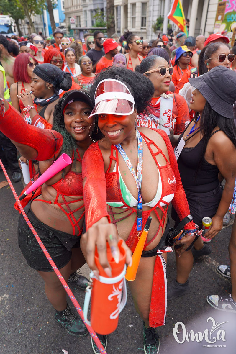 Omnia Carnival masqueraders on the road at Notting Hill Carnival 2026