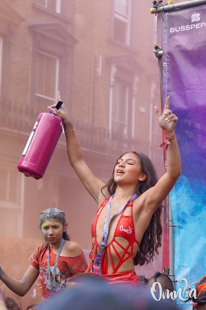 Omnia Carnival masqueraders on the road at Notting Hill Carnival 2026