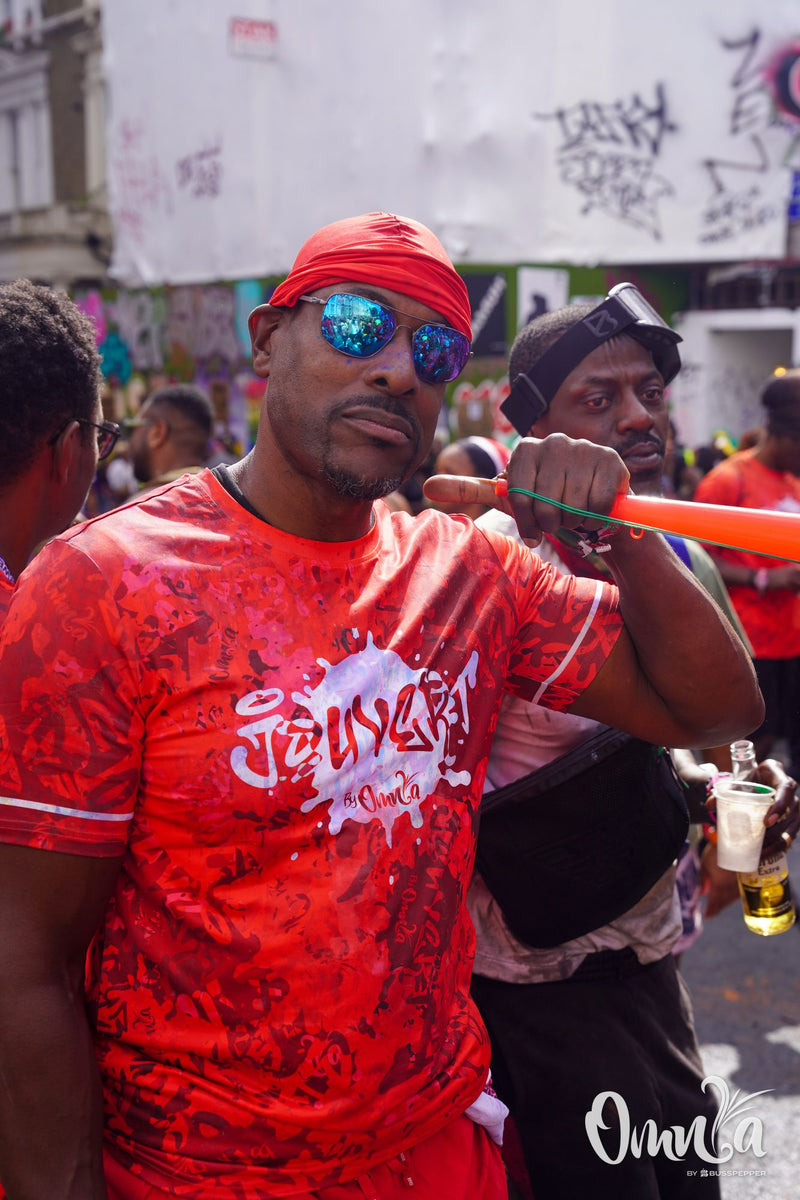 Omnia Carnival masqueraders on the road at Notting Hill Carnival 2026