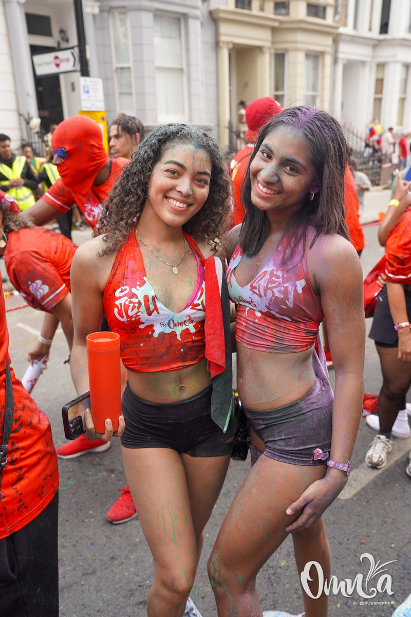 Omnia Carnival masqueraders on the road at Notting Hill Carnival 2026
