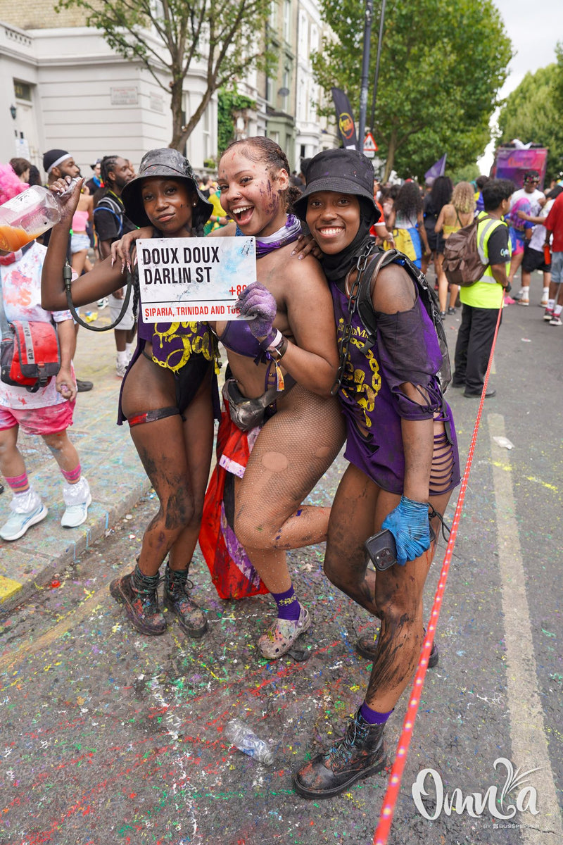 Omnia Carnival masqueraders on the road at Notting Hill Carnival 2026