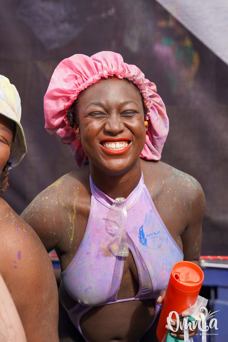 Omnia Carnival masqueraders on the road at Notting Hill Carnival 2026