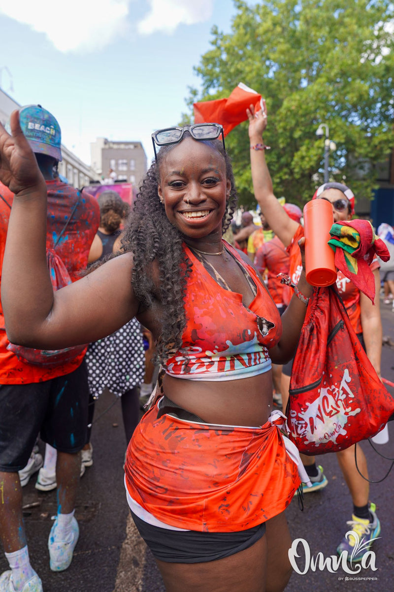Omnia Carnival masqueraders on the road at Notting Hill Carnival 2026