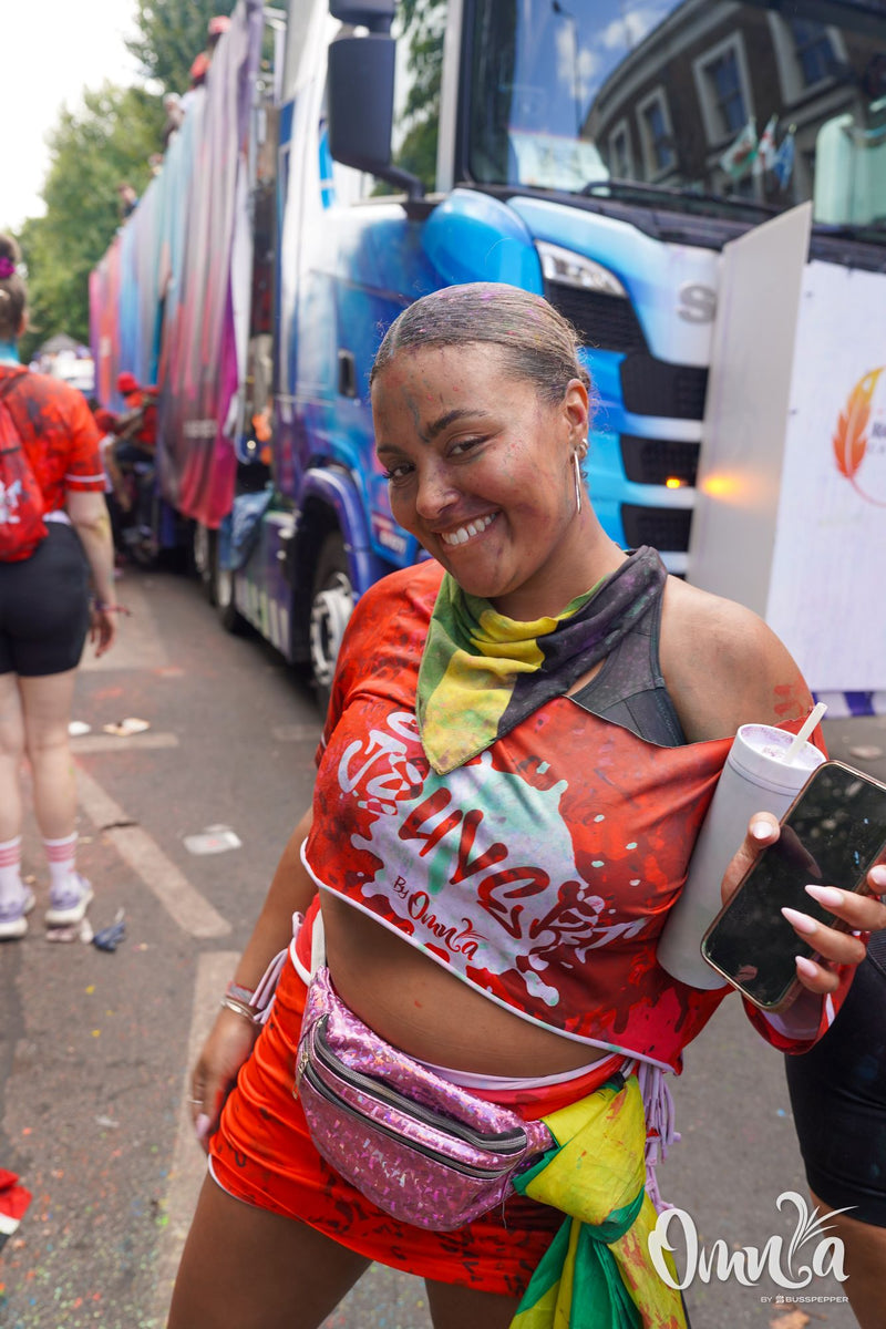 Omnia Carnival masqueraders on the road at Notting Hill Carnival 2026