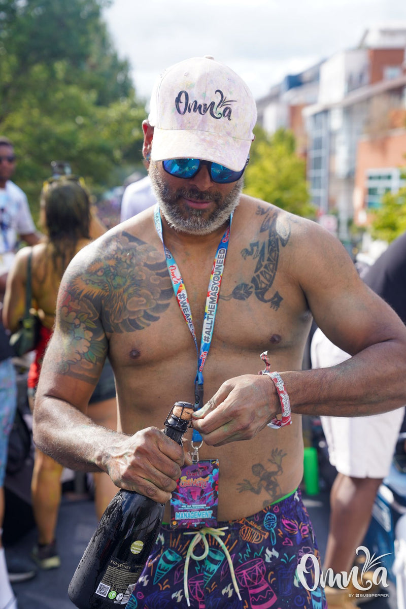 Omnia Carnival masqueraders on the road at Notting Hill Carnival 2026