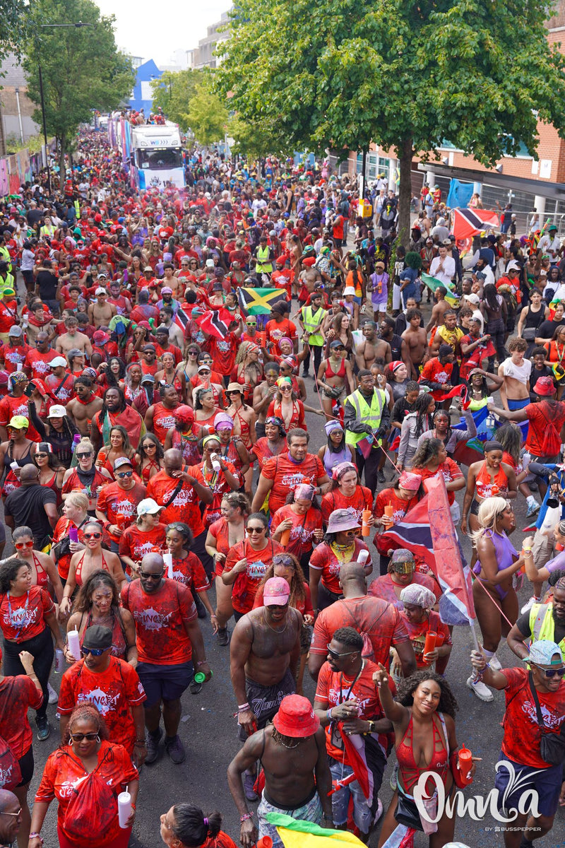 Omnia Carnival masqueraders on the road at Notting Hill Carnival 2026