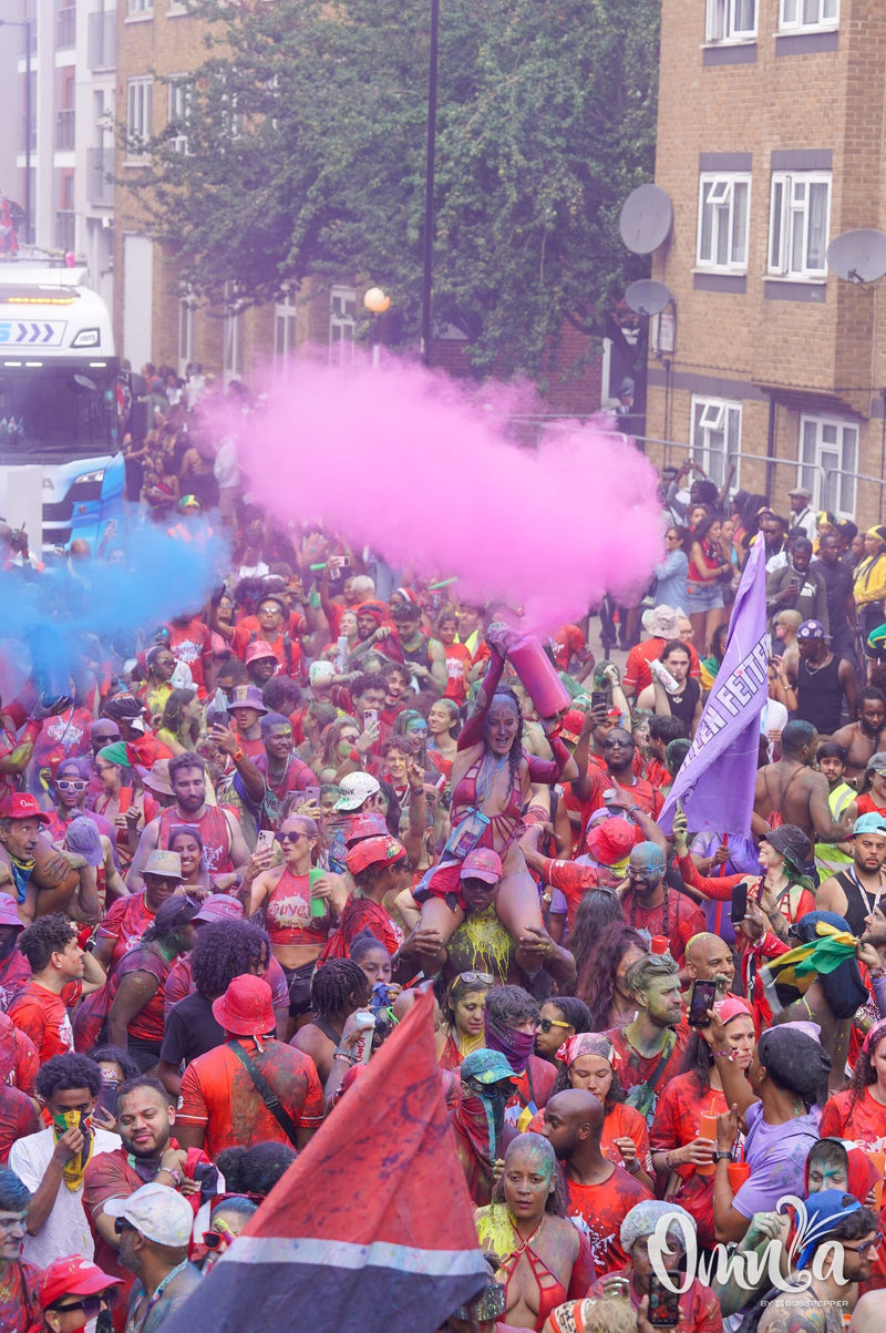 Omnia Carnival masqueraders on the road at Notting Hill Carnival 2026