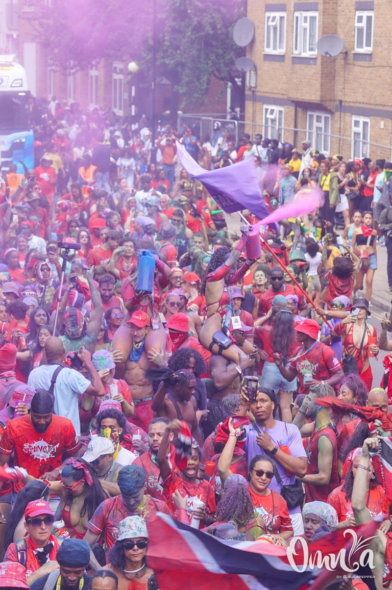 Omnia Carnival masqueraders on the road at Notting Hill Carnival 2026