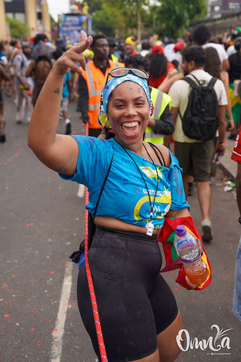 Omnia Carnival masqueraders on the road at Notting Hill Carnival 2026