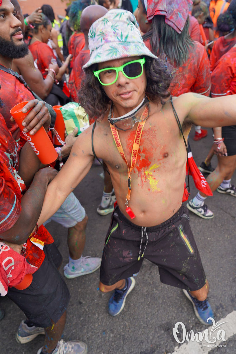 Omnia Carnival masqueraders on the road at Notting Hill Carnival 2026