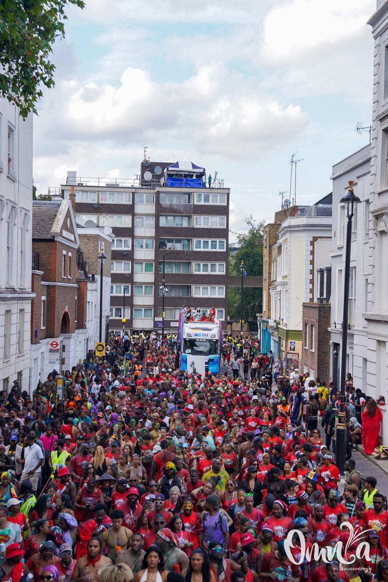 Omnia Carnival masqueraders on the road at Notting Hill Carnival 2026