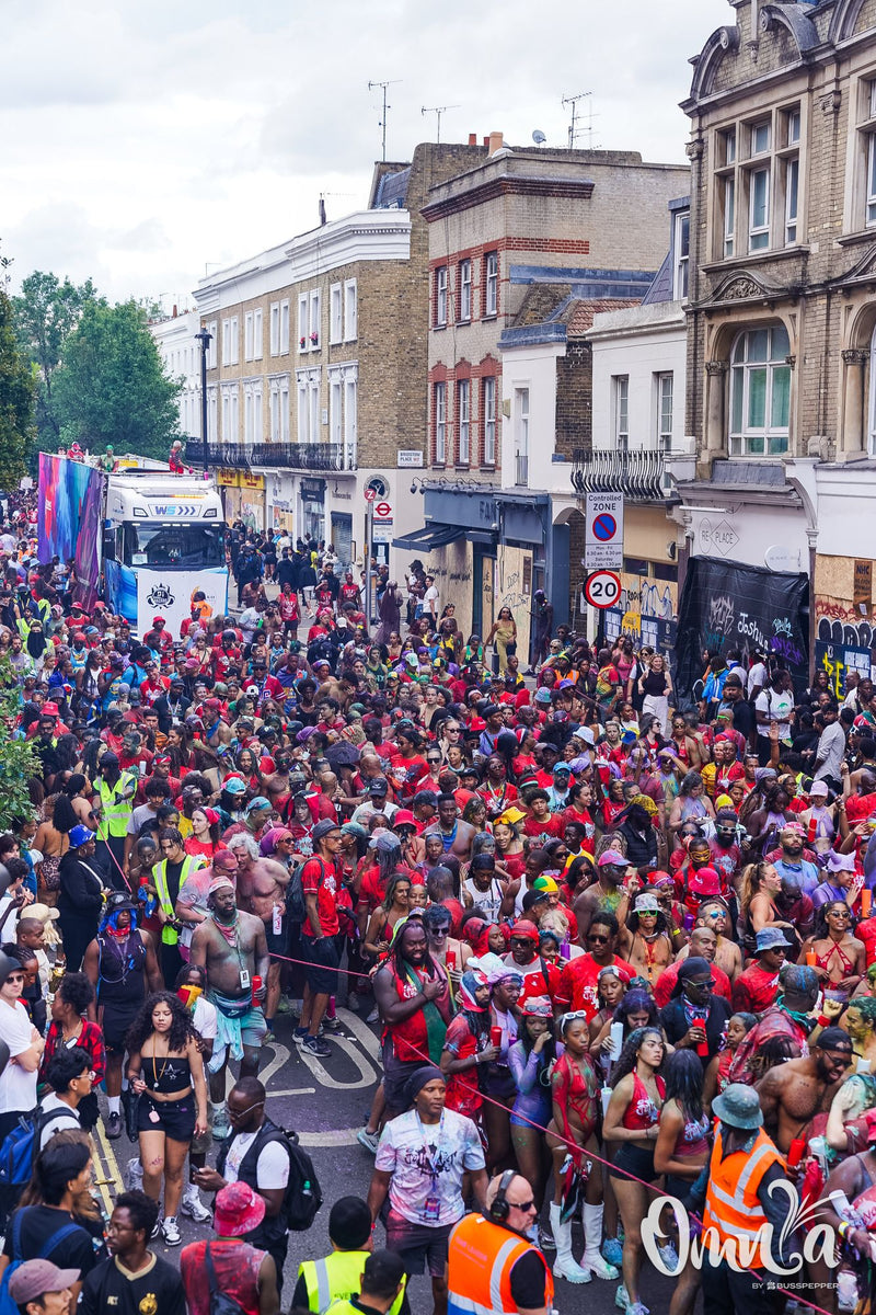 Omnia Carnival masqueraders on the road at Notting Hill Carnival 2026